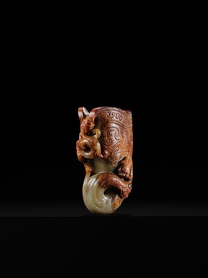 Lot 103 - AN EXCEPTIONAL AND IMPORTANT CELADON AND RUSSET ‘CHILONG’ RHYTON, HAN DYNASTY