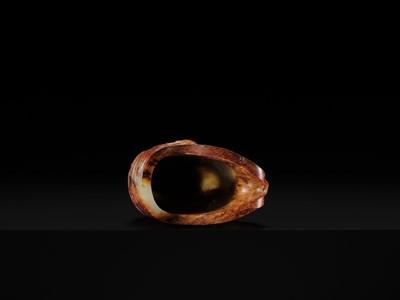 Lot 103 - AN EXCEPTIONAL AND IMPORTANT CELADON AND RUSSET ‘CHILONG’ RHYTON, HAN DYNASTY