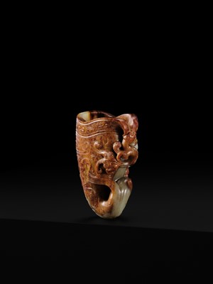 Lot 103 - AN EXCEPTIONAL AND IMPORTANT CELADON AND RUSSET ‘CHILONG’ RHYTON, HAN DYNASTY