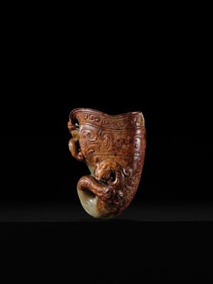 Lot 103 - AN EXCEPTIONAL AND IMPORTANT CELADON AND RUSSET ‘CHILONG’ RHYTON, HAN DYNASTY