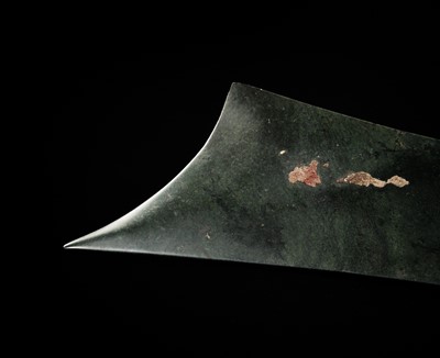 Lot 65 - A RARE AND VERY LARGE (48 CM) DARK GREEN JADE CEREMONIAL BLADE, YAZHANG, SHIMAO CULTURE