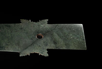 Lot 65 - A RARE AND VERY LARGE (48 CM) DARK GREEN JADE CEREMONIAL BLADE, YAZHANG, SHIMAO CULTURE