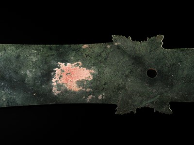 Lot 65 - A RARE AND VERY LARGE (48 CM) DARK GREEN JADE CEREMONIAL BLADE, YAZHANG, SHIMAO CULTURE