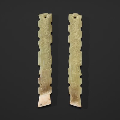 A PAIR OF YELLOWISH GREEN JADE ‘DRAGONS AND PHOENIX’ PLAQUES, WESTERN ZHOU DYNASTY