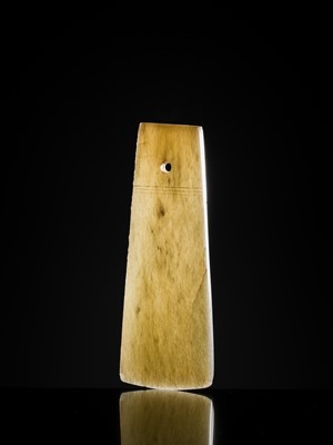 Lot 80 - A GREENISH-WHITE JADE CEREMONIAL AXE BLADE, YUE, LATE SHANG-WESTERN ZHOU DYNASTY