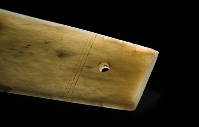 Lot 80 - A GREENISH-WHITE JADE CEREMONIAL AXE BLADE, YUE, LATE SHANG-WESTERN ZHOU DYNASTY
