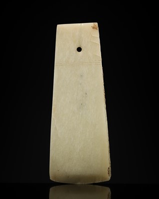 Lot 80 - A GREENISH-WHITE JADE CEREMONIAL AXE BLADE, YUE, LATE SHANG-WESTERN ZHOU DYNASTY