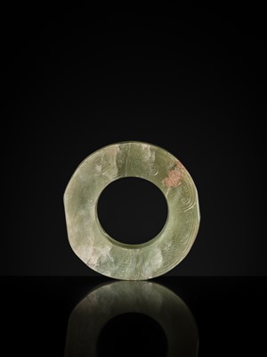 Lot 88 - A GREEN JADE ‘DRAGONS AND BIRDS’ RING-FORM PENDANT, EASTERN ZHOU DYNASTY