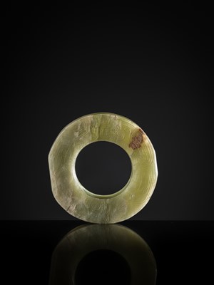 Lot 88 - A GREEN JADE ‘DRAGONS AND BIRDS’ RING-FORM PENDANT, EASTERN ZHOU DYNASTY