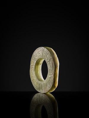 Lot 88 - A GREEN JADE ‘DRAGONS AND BIRDS’ RING-FORM PENDANT, EASTERN ZHOU DYNASTY