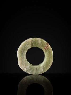 Lot 88 - A GREEN JADE ‘DRAGONS AND BIRDS’ RING-FORM PENDANT, EASTERN ZHOU DYNASTY
