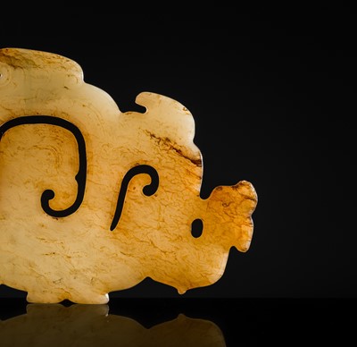 Lot 83 - A WHITE AND RUSSET JADE ‘PHOENIX AND DRAGONS’ OPENWORK PENDANT, WESTERN ZHOU DYNASTY