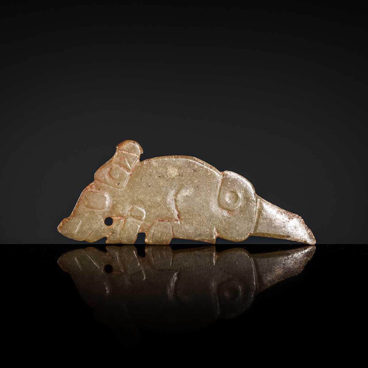 Lot 70 - A CELADON JADE ‘KUI DRAGON’ PENDANT, WESTERN ZHOU DYNASTY