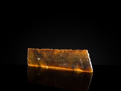 Lot 82 - A RARE BROWN JADE ‘ANIMAL MASK’ HARVESTING KNIFE, HU, SPRING AND AUTUMN PERIOD