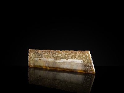 Lot 82 - A RARE BROWN JADE ‘ANIMAL MASK’ HARVESTING KNIFE, HU, SPRING AND AUTUMN PERIOD