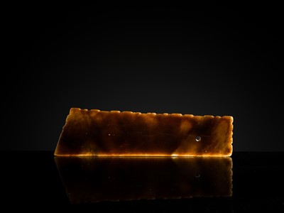 Lot 82 - A RARE BROWN JADE ‘ANIMAL MASK’ HARVESTING KNIFE, HU, SPRING AND AUTUMN PERIOD