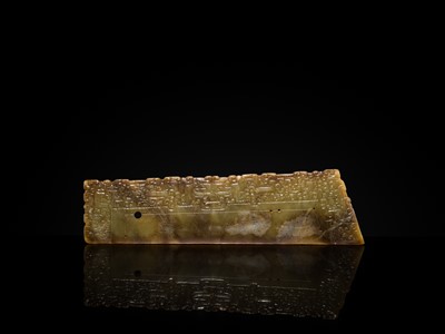 Lot 82 - A RARE BROWN JADE ‘ANIMAL MASK’ HARVESTING KNIFE, HU, SPRING AND AUTUMN PERIOD