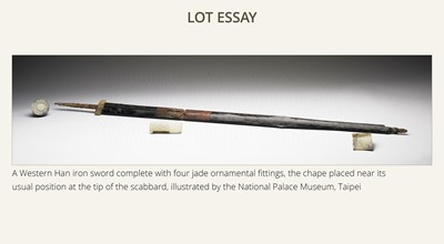 Lot 90 - A YELLOW AND RUSSET JADE ‘BOVINE MASK’ SCABBARD CHAPE, BI, SPRING AND AUTUMN PERIOD