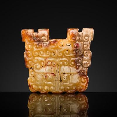 Lot 90 - A YELLOW AND RUSSET JADE ‘BOVINE MASK’ SCABBARD CHAPE, BI, SPRING AND AUTUMN PERIOD