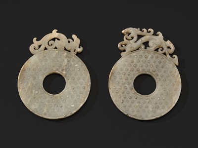 A PAIR OF FINE WHITE JADE ‘DRAGON AND PHOENIX’ DISKS (BI), WESTERN HAN DYNASTY