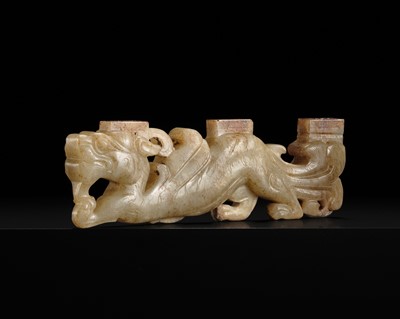 Lot 87 - A RARE AND UNUSUAL THREE-TIERED JADE ‘DRAGON’ FITTING, HAN DYNASTY