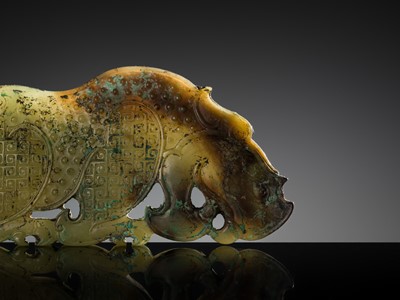 Lot 92 - A FINE AND LARGE GREEN JADE ‘RHINOCEROS’ PLAQUE, WARRING STATES PERIOD-WESTERN HAN DYNASTY