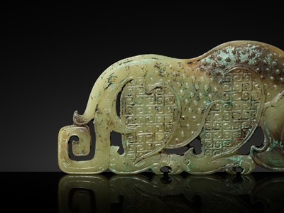 Lot 92 - A FINE AND LARGE GREEN JADE ‘RHINOCEROS’ PLAQUE, WARRING STATES PERIOD-WESTERN HAN DYNASTY