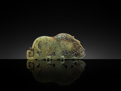 Lot 92 - A FINE AND LARGE GREEN JADE ‘RHINOCEROS’ PLAQUE, WARRING STATES PERIOD-WESTERN HAN DYNASTY