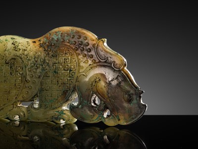 Lot 92 - A FINE AND LARGE GREEN JADE ‘RHINOCEROS’ PLAQUE, WARRING STATES PERIOD-WESTERN HAN DYNASTY