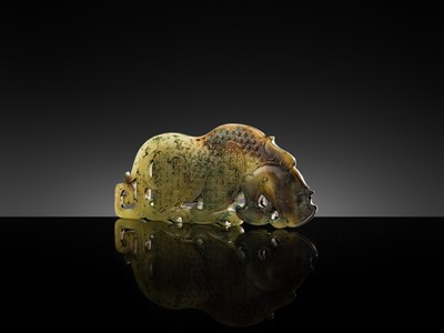 Lot 92 - A FINE AND LARGE GREEN JADE ‘RHINOCEROS’ PLAQUE, WARRING STATES PERIOD-WESTERN HAN DYNASTY
