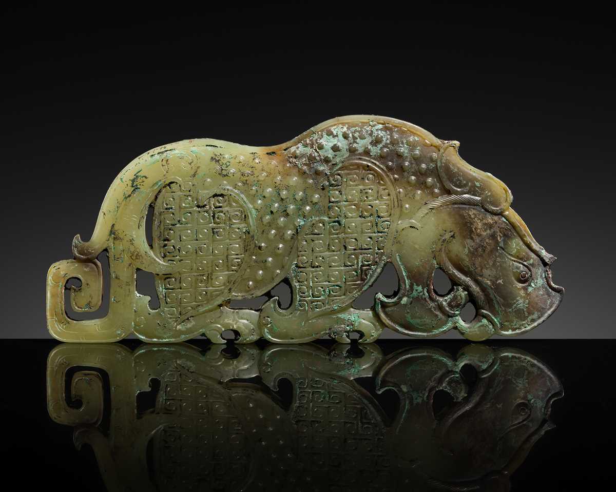 Lot 92 - A FINE AND LARGE GREEN JADE ‘RHINOCEROS’ PLAQUE, WARRING STATES PERIOD-WESTERN HAN DYNASTY
