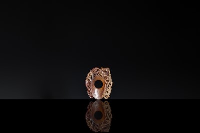 Lot 97 - A RUSSET JADE ‘CHILONG AND PHOENIX’ ARCHER’S RING PENDANT, SHE, HAN DYNASTY