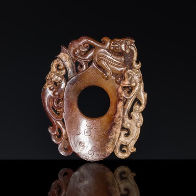 Lot 97 - A RUSSET JADE ‘CHILONG AND PHOENIX’ ARCHER’S RING PENDANT, SHE, HAN DYNASTY