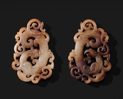 Lot 96 - A PAIR OF WHITE AND RUSSET JADE ‘CHILONG AND PHOENIX’ PENDANTS, PEI, WESTERN HAN DYNASTY
