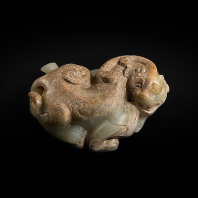 A SUPERB PALE CELADON JADE CARVING OF A TIANLU, WESTERN HAN DYNASTY