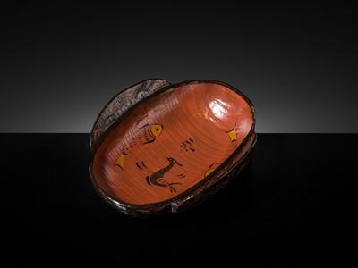 Lot 104 - A BROWN AND RED LACQUER ‘EAR’ CUP, ERBEI, WARRING STATES PERIOD TO WESTERN HAN DYNASTY