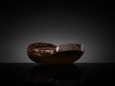 Lot 104 - A BROWN AND RED LACQUER ‘EAR’ CUP, ERBEI, WARRING STATES PERIOD TO WESTERN HAN DYNASTY
