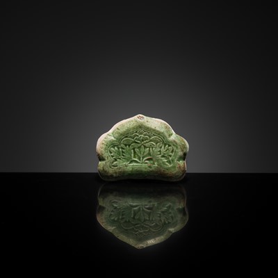 Lot 143 - A CIZHOU RUYI-SHAPED MINIATURE PILLOW, 10TH-11TH CENTURY