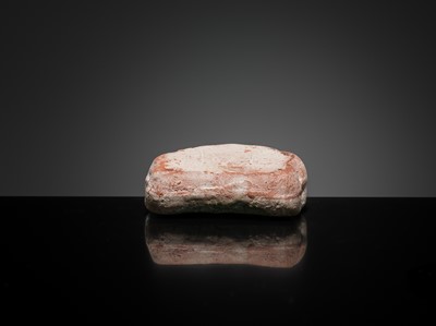 Lot 143 - A CIZHOU RUYI-SHAPED MINIATURE PILLOW, 10TH-11TH CENTURY