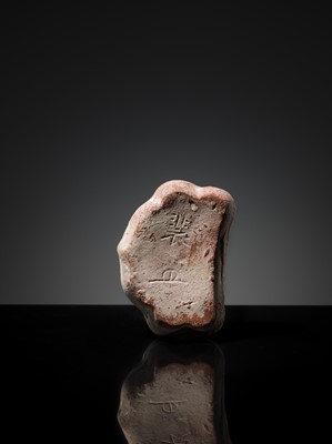 Lot 143 - A CIZHOU RUYI-SHAPED MINIATURE PILLOW, 10TH-11TH CENTURY