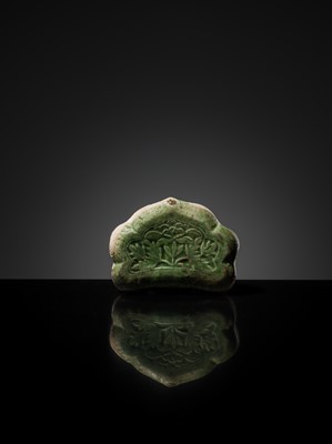 Lot 143 - A CIZHOU RUYI-SHAPED MINIATURE PILLOW, 10TH-11TH CENTURY