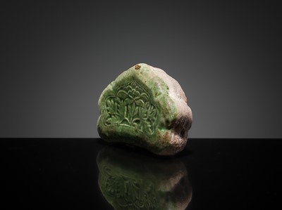 Lot 143 - A CIZHOU RUYI-SHAPED MINIATURE PILLOW, 10TH-11TH CENTURY