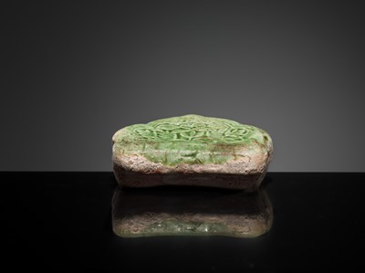 Lot 143 - A CIZHOU RUYI-SHAPED MINIATURE PILLOW, 10TH-11TH CENTURY