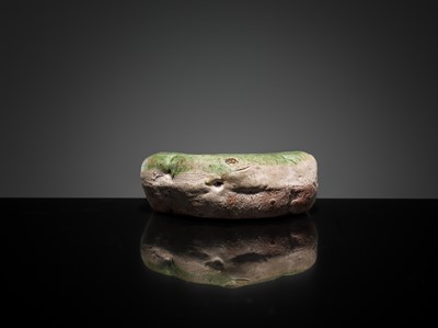 Lot 143 - A CIZHOU RUYI-SHAPED MINIATURE PILLOW, 10TH-11TH CENTURY