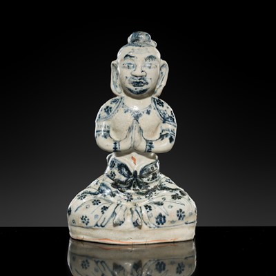 Lot 262 - A BLUE AND WHITE PORCELAIN FIGURE OF BUDDHA, KOREA, EARLIER JOSEON DYNASTY