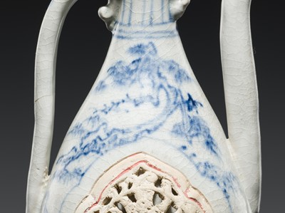 Lot 186 - A RETICULATED BLUE AND WHITE EWER, LÊ DYNASTY, LATE 15TH CENTURY, FROM THE HOI AN HOARD