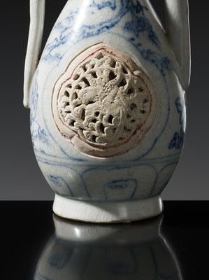 Lot 186 - A RETICULATED BLUE AND WHITE EWER, LÊ DYNASTY, LATE 15TH CENTURY, FROM THE HOI AN HOARD