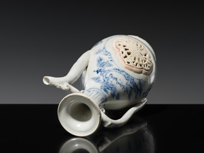 Lot 186 - A RETICULATED BLUE AND WHITE EWER, LÊ DYNASTY, LATE 15TH CENTURY, FROM THE HOI AN HOARD