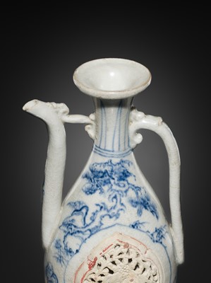 Lot 186 - A RETICULATED BLUE AND WHITE EWER, LÊ DYNASTY, LATE 15TH CENTURY, FROM THE HOI AN HOARD