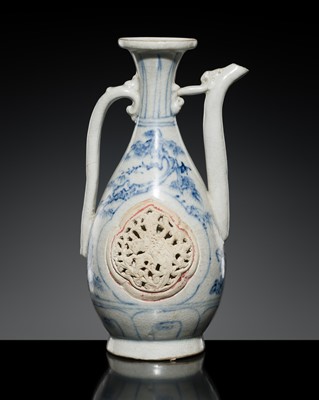 Lot 186 - A RETICULATED BLUE AND WHITE EWER, LÊ DYNASTY, LATE 15TH CENTURY, FROM THE HOI AN HOARD